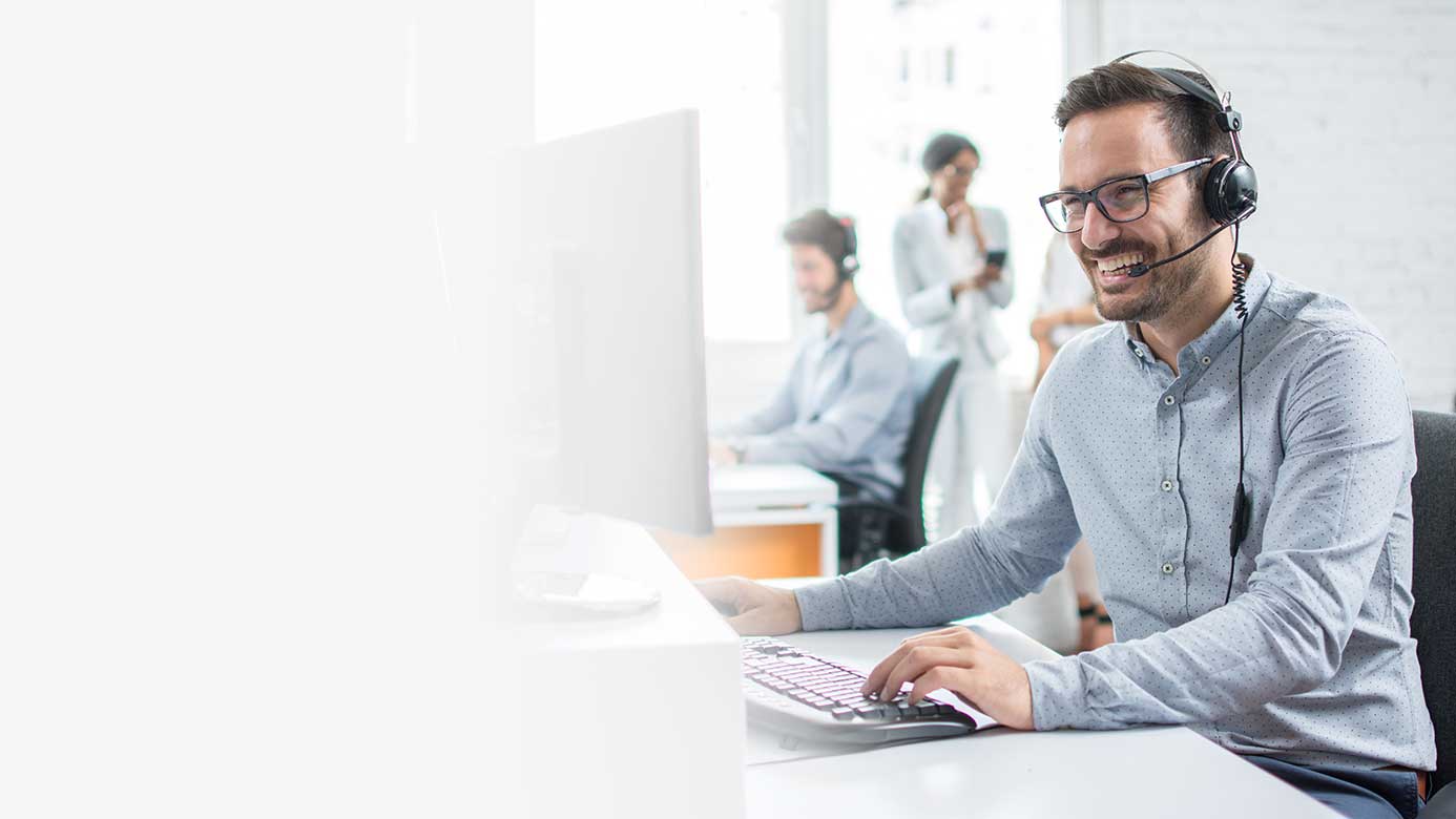 Picture of a man talking in a headset